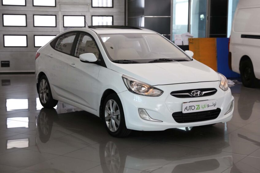 2015Hyundai AccentWhite • Autoz Qatar